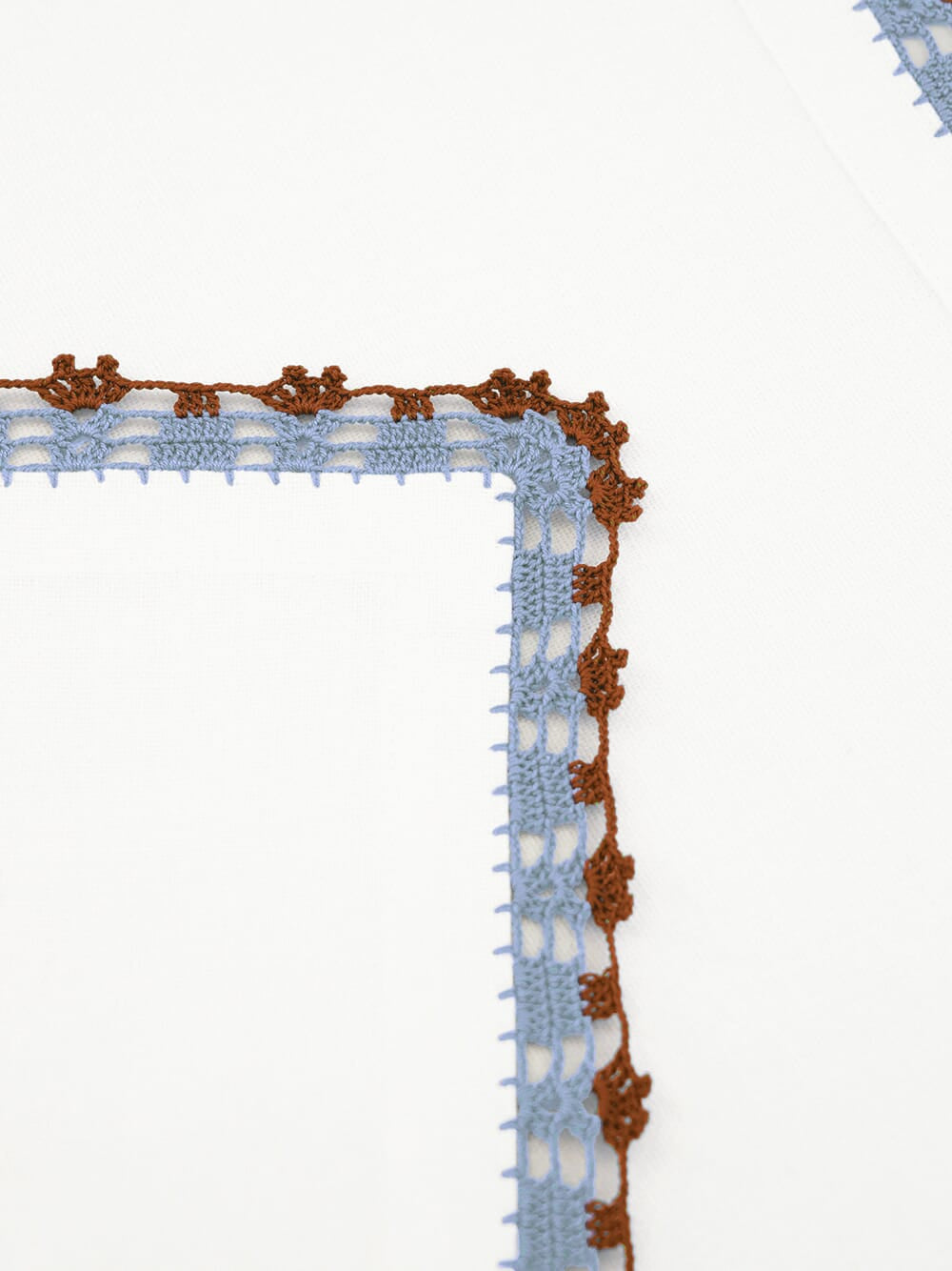 Hand-Embroidered Leonor Ecru Linen with Blue and Brown Crochet Napkin